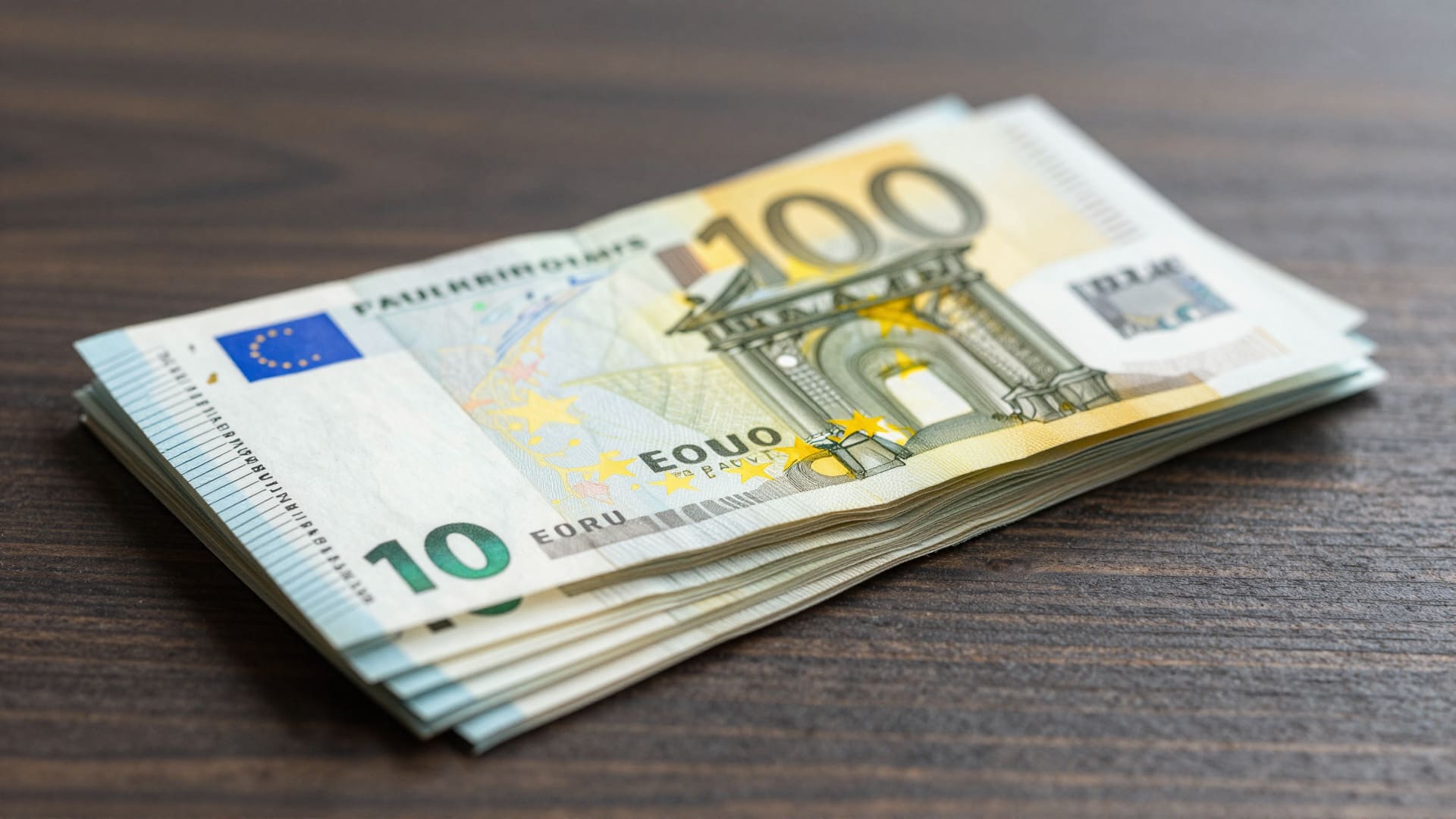 Stack of Euro banknotes on a table